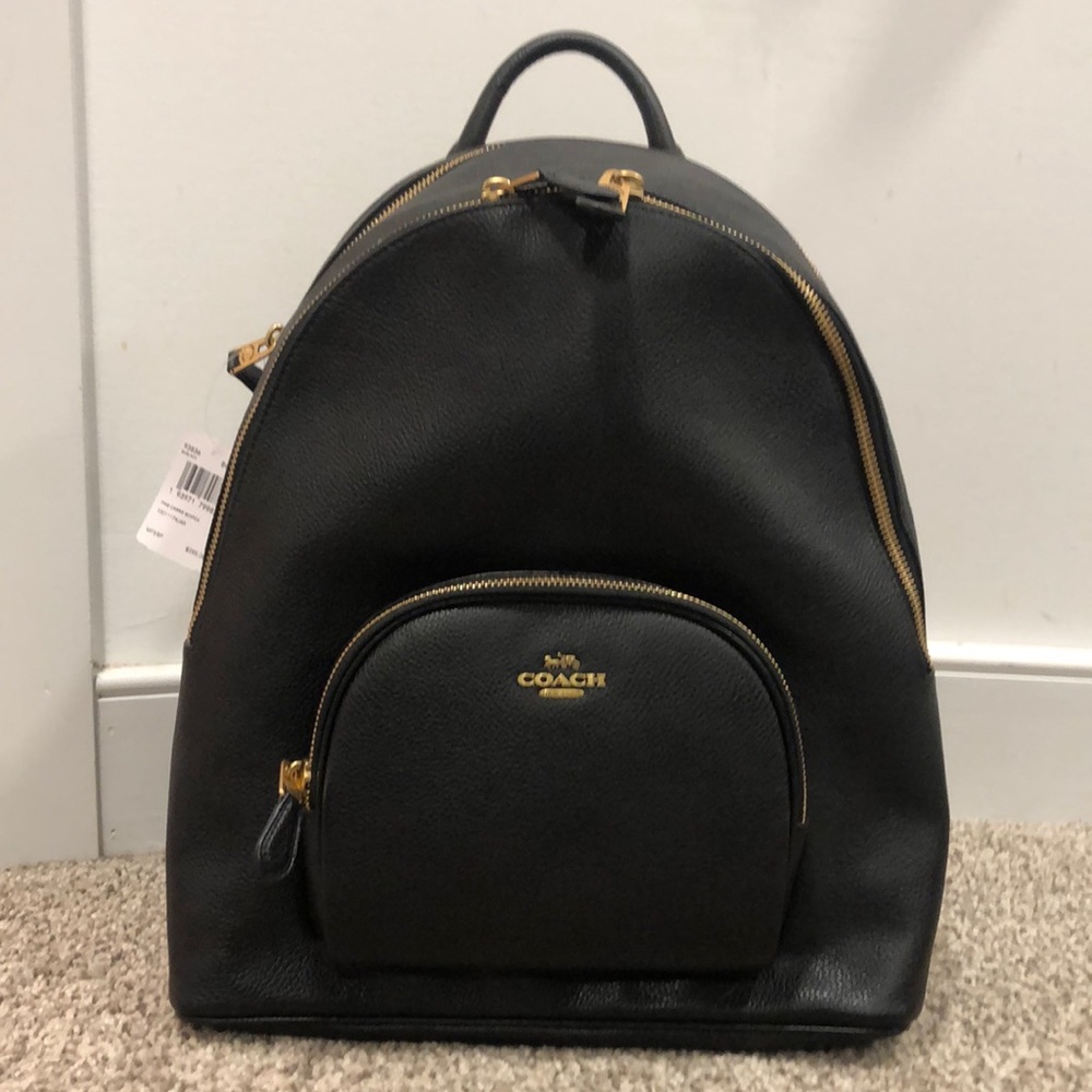 BRAND NEW COACH black pebbled backpack. With tags